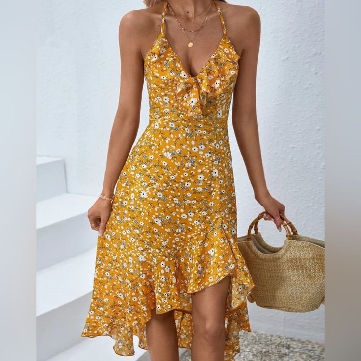 VESTIDO AMARILLO CON VUELO delante AMARIL