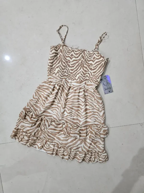 VESTIDO BLANCO CON PATRONES MARRONES VTD49