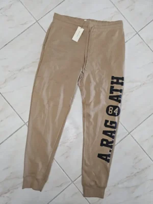 MONO DE HOMBRE BEIGE MN15