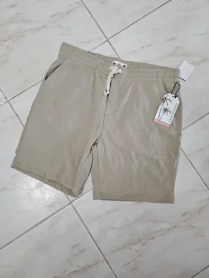 SHORT BEIGE DE HOMBRE SHT78