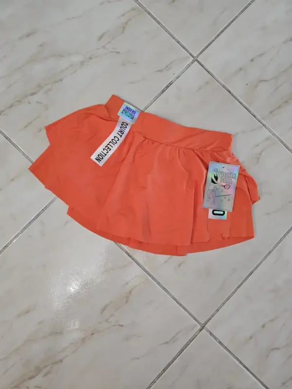 SHORT NARANJA DE MUJER SHT114