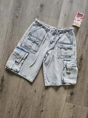 BERMUDA DE MEZCLILLA DE MUJER BMD47