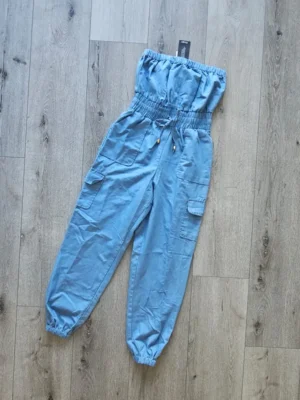 MONO AZUL DE MUJER MN37