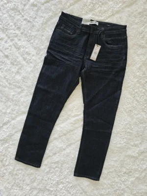 PANTALÓN NEGRO REACTION PTN135