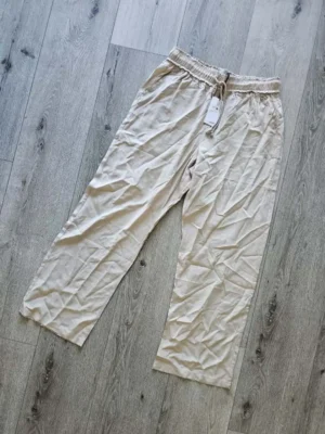 PANTALONETA BEIGE PTNT14