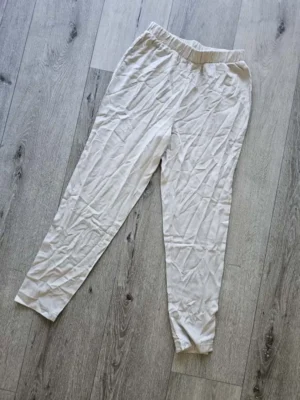 PANTALONETA BEIGE PTNT15