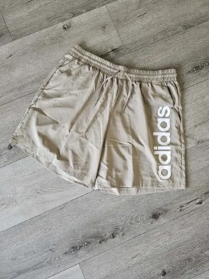 SHORT BEIGE ADIDAS SHT189