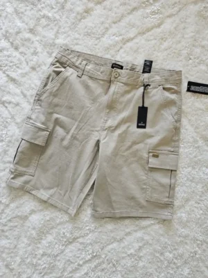 SHORT BEIGE BÚFALO SHT177