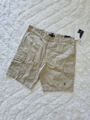 SHORT BEIGE POLO SHT159