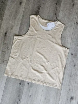 CAMISETA BEIGE CMST56