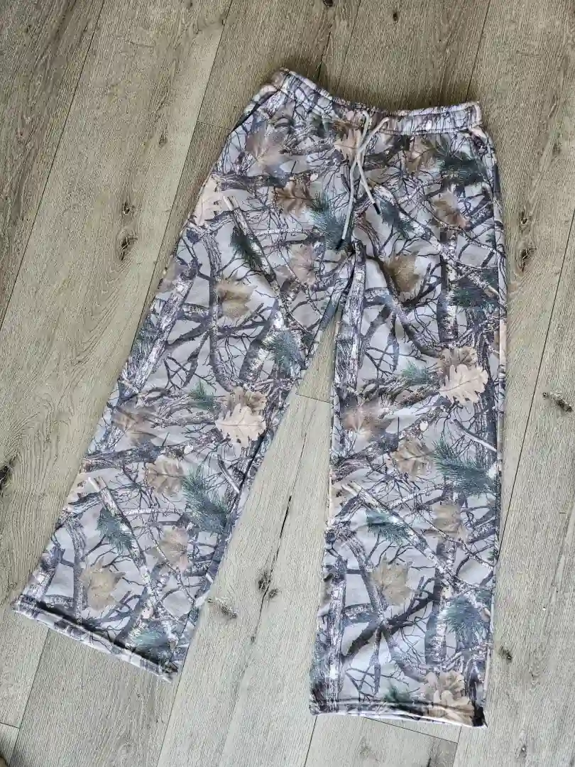 MONO GRIS DE HOJAS MN55