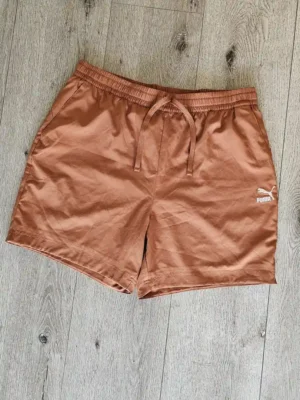 SHORT NARANJA SHT225