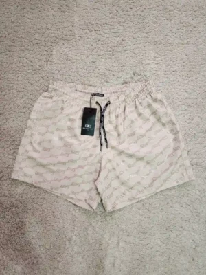 SHORT DE PLAYA BALENCIAGA SHT279