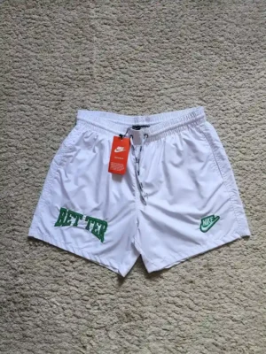 SHORT DE PLAYA NIKE SHT277