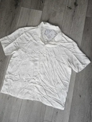 CAMISA CMS331