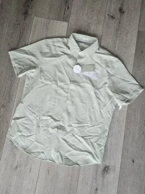 CAMISA CMS335
